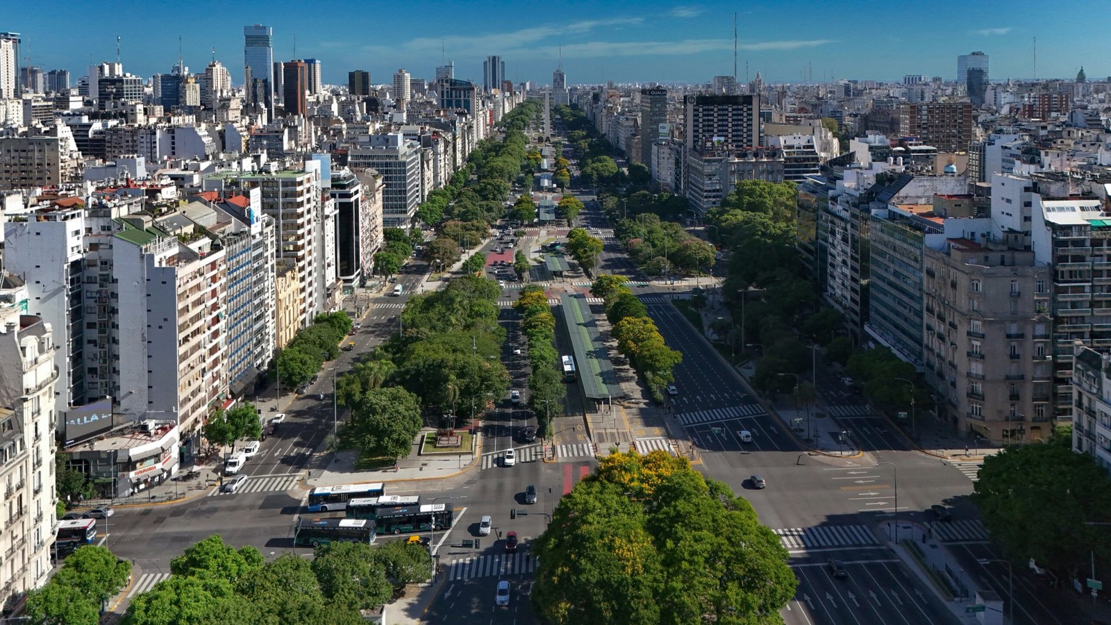 an aerial view of a city with tall buildings